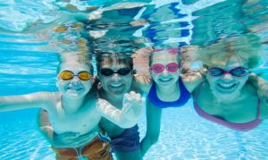 Family enjoys pool at Brenham Country Club